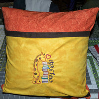 Giraffe story hour book pillow 18x18-Quick Stitch Designs